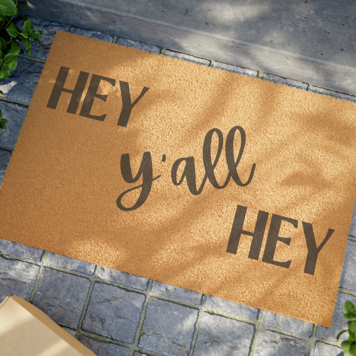 Hey Y'all Hey Doormat only at Bling & Bloom's Boutique Decor Bling & Bloom's Boutique Meet the perfect welcoming doormat. Hey Y'all Hey! Each custom mat comes in a 24" x 16" size and is made with Grade A tufted coir coconut fiber, making it perfect fo