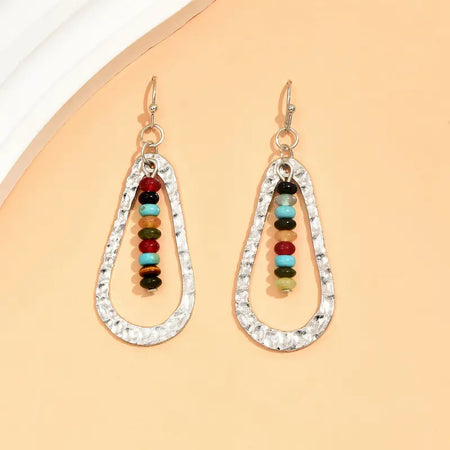 Boho Colorful Beaded Earringss only at Bling & Bloom's Boutique | Vint Earrings Bling & Bloom's Boutique Boho Colorful Beaded Earrings Bring a fun, unique touch to any outfit with these vibrant beaded earrings. They'll be sure to turn heads and make your look shine.
Boh