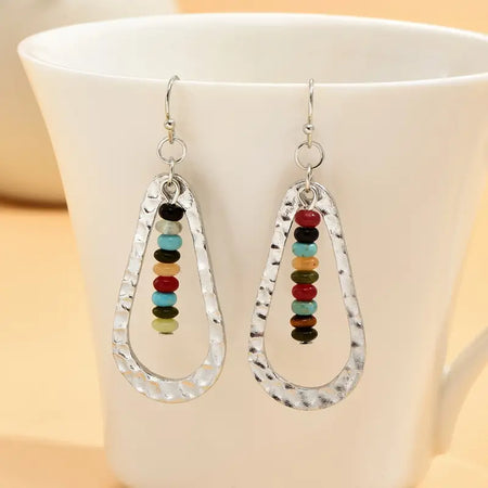 Boho Colorful Beaded Earringss only at Bling & Bloom's Boutique | Vint Earrings Bling & Bloom's Boutique Boho Colorful Beaded Earrings Bring a fun, unique touch to any outfit with these vibrant beaded earrings. They'll be sure to turn heads and make your look shine.
Boh