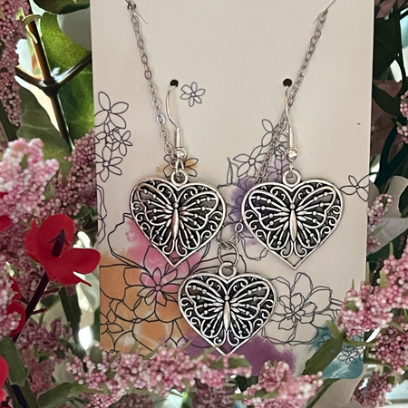 Silver Heart Butterfly Earrings and Necklace | Jewelry Sets | Gifts fo Jewelry Sets Bling & Bloom's Boutique Antique silver heart butterfly earrings and necklace jewelry set. Lightweight and dainty. Perfect for that birthday girl or woman in your life. 
