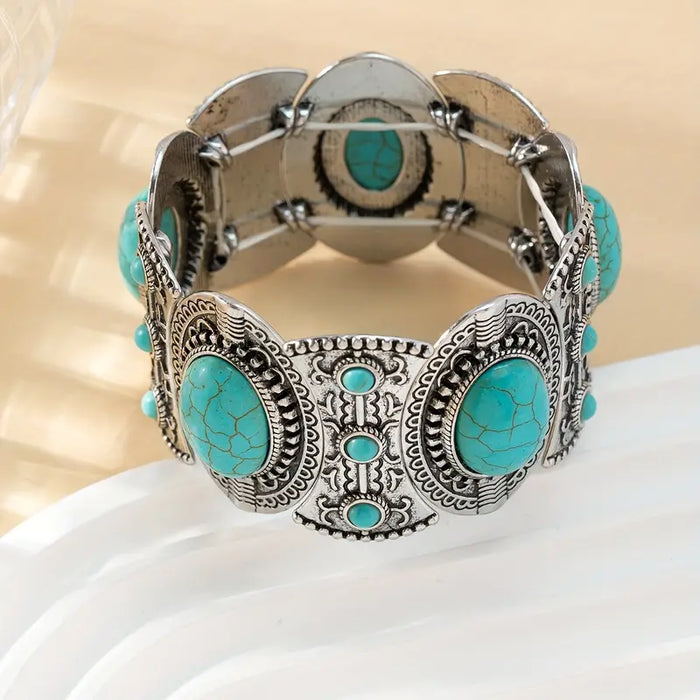 Western Turquoise Elastic Bracelet only at Bling & Bloom's Boutique |  Bracelets Bling & Bloom's Boutique Western Turquoise Elastic Bracelet Crafted with intricate detail, the Western Turquoise Elastic Bracelet is a stunning piece that adds a touch of sophistication to a