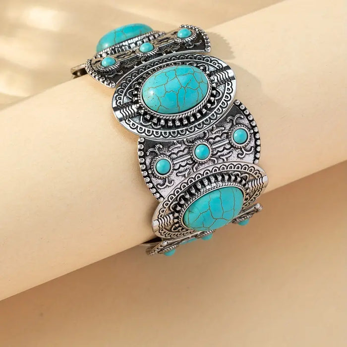 Western Turquoise Elastic Bracelet only at Bling & Bloom's Boutique |  Bracelets Bling & Bloom's Boutique Western Turquoise Elastic Bracelet Crafted with intricate detail, the Western Turquoise Elastic Bracelet is a stunning piece that adds a touch of sophistication to a