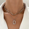 Square Double Layer Necklace only at Bling & Bloom's Boutique | Women' Necklaces Bling & Bloom's Boutique Square Double Layer Necklace This stunning necklace combines two beautiful layers of square-cut pendants. Perfect for adding a touch of sparkle and shine to any outf