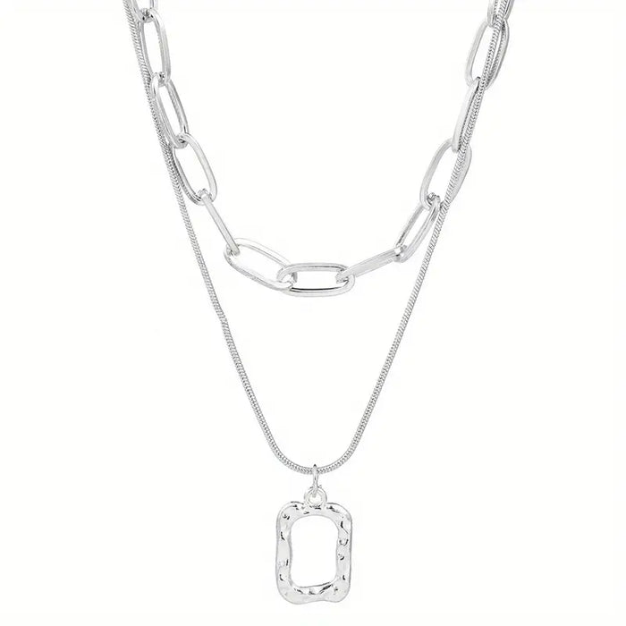 Square Double Layer Necklace only at Bling & Bloom's Boutique | Women' Necklaces Bling & Bloom's Boutique Square Double Layer Necklace This stunning necklace combines two beautiful layers of square-cut pendants. Perfect for adding a touch of sparkle and shine to any outf