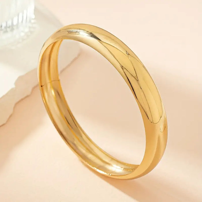 Gold Retro Bracelet at Bling & Bloom's Boutique | Solid Round Bracelet