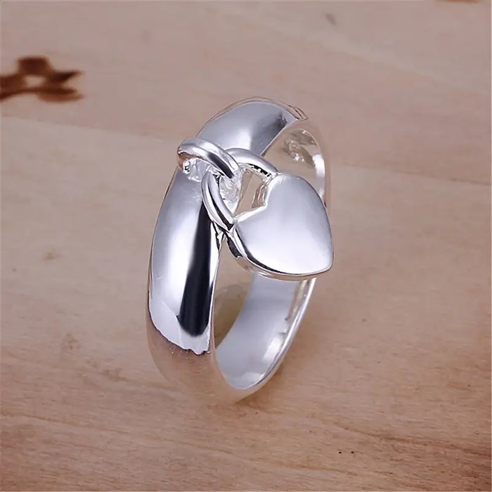 Lovely Heart Silver Ring | Heart Charm Ring | Promise Ring | Size 6 Wo Rings Bling & Bloom's Boutique Lovely Heart Silver Ring Beautifully crafted with shimmering silver and a delightful heart charm, this ring makes a perfect gift for any special occasion - or just t