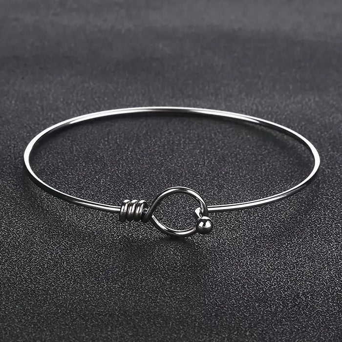 Stainless Steel Round Bracelet only at Bling & Bloom's Boutique | Open Bracelets Bling & Bloom's Boutique Stainless Steel Round Open Bangle Bracelet A stunning piece of jewelry that'll make heads turn - Stainless Steel Round Open Bangle Bracelet to be exact! Slip it on y