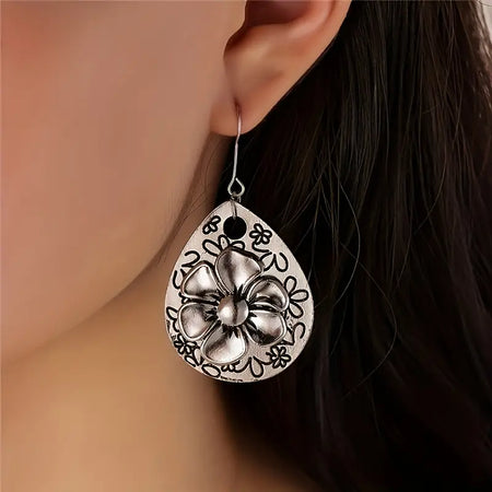 Vintage Engraved Flower Earrings only at Bling & Bloom's Boutique | 3D Earrings Bling & Bloom's Boutique 3D Vintage Engraved Flower Earrings Adorned with intricate details, these earrings make the perfect accessory for any outfit. Dress them up or keep it casual - eithe