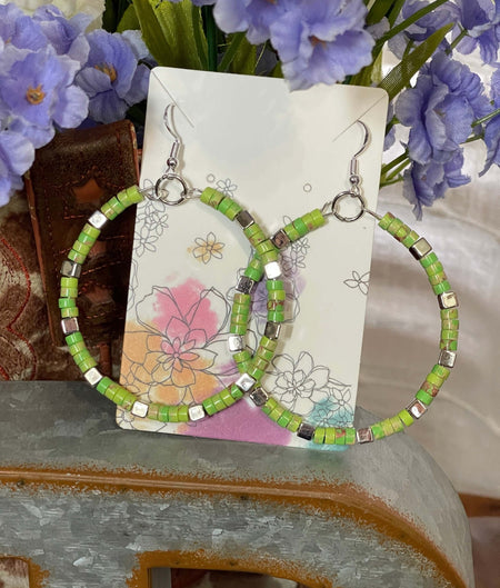 Green Jasper Stone Hoop Earrings only at Bling & Bloom's Boutique | Gr Earrings Bling & Bloom's Boutique Handmade Green Jasper Earrings Large 2-3/8 inch Hoops with Natural Green Imperial Jasper Flat Round Stones and Silver Square Spacers. Set with normal ear hooks, colo