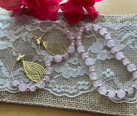 Pink Rose Quartz Earrings |  Pink Stone Bracelet | Etched Gold Charm | Jewelry Sets Bling & Bloom's Boutique Pretty in Pink: This beautiful handmade set of earrings and bracelet are decorated in Rose Quartz Stones with Gold Spacers. These earrings have an etched gold charm 