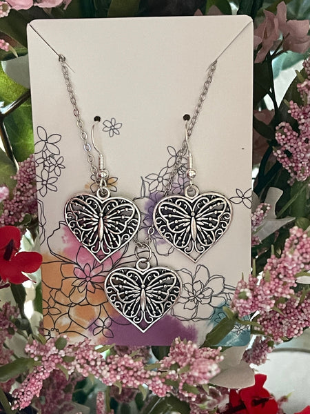 Silver Heart Butterfly Earrings and Necklace | Jewelry Sets | Gifts fo Jewelry Sets Bling & Bloom's Boutique Antique silver heart butterfly earrings and necklace jewelry set. Lightweight and dainty. Perfect for that birthday girl or woman in your life. 
