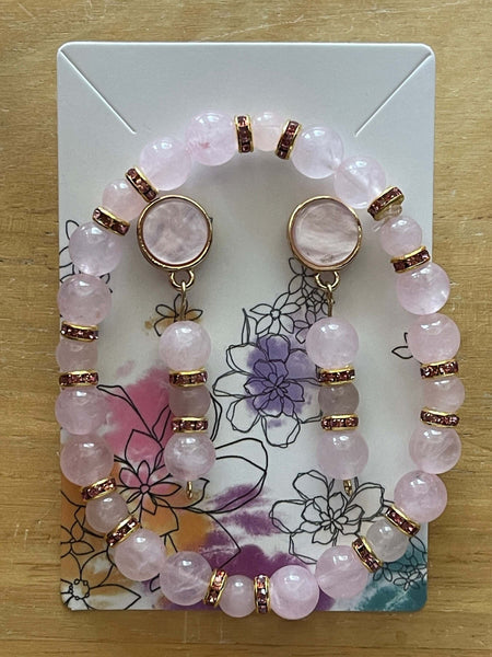 Pink Pearl Flat Stud Earrings | Dangling Rose Quartz | Pink Rhinestone Jewelry Sets Bling & Bloom's Boutique Handmade to impress with Stud Pink Pearl Earrings Dangling with Rose Quartz and Pink Rhinestones and Matching Bracelet. These earrings are outlined in gold to set th